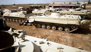 Seven captured Iraqi BMP-1 IFVs and an MT-LB-based armored ambulance at Baghdad International Airport (BIAP), Iraq, during Operation Iraq Freedom. US Air Force (USAF), Explosive Ordinance Disposal (EOD) units, are charged with the weapon systems for disposals.