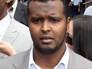 Terror suspects Abdirahman Ahmed (L) and Yacqub Khayre walk free from the County Court in Melbourne after a Not Guilty finding in their terrorism trial.