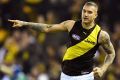 Dustin Martin celebrates one of his two goals against North Melbourne.