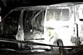 The remains of a van outside the Australian Christian Lobby offices. A Canberra man has been charged over the explosion.