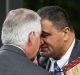 Rex Tillerson is greeted with a hongi by Parliamentary kaumatua Kura Moeahu and Defence Minister Gerry Brownlee on Tuesday.