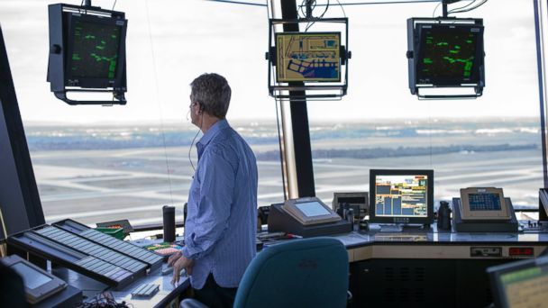 PHOTO: FAA Air Traffic Controller works in the Dulles International Airport Air Traffic Control Tower in Sterling, Va., Sept. 27, 2016. 