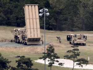 FILE - In this May 2, 2017, file photo, a U.S. missile defense system called Terminal High Altitude Area Defense, or THAAD, is installed on a golf course in Seongju, South Korea.