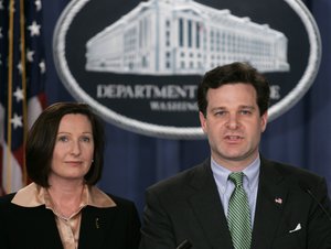 Assistant Attorney General, Christopher Wray, right, and Director of the Executive Office for U.S. Attorneys, Mary Beth Buchanan, hold a press conference, Wednesday, Jan. 12, 2005, in Washington.