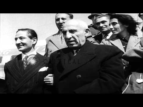 Mohammed Mossadegh, Premier of Iran enters a car  in New York City. HD Stock Footage