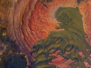 Martian bedrock and sand dunes look very much like Earth. Picture: