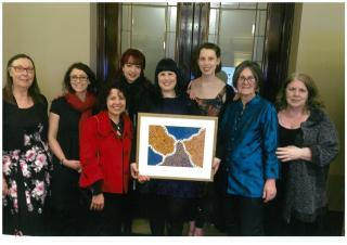 HAAG members and staff holding their award from the CHP Homelessness Conference