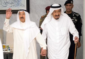 In this Tuesday, June 6, 2017 photo released by Saudi Press Agency, SPA, Saudi King Salman bin Abdulaziz Al Saud, right, receives Kuwait's Emir Sheikh Jaber al-Ahmad al-Sabah in Jiddah, Saudi Arabia.