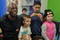 Seal visiting the Sydney Children's Hospital this week where he caught up with Canberra girl Freyja Christiansen (right ...