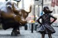 "Charging Bull" and "Fearless Girl" face off against each other in New York.