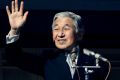 TOKYO - DECEMBER 23: (L-R) Emperor Akihito and Empress Michiko greet the well-wishers gathered to celebrate the ...