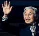 TOKYO - DECEMBER 23: (L-R) Emperor Akihito and Empress Michiko greet the well-wishers gathered to celebrate the ...