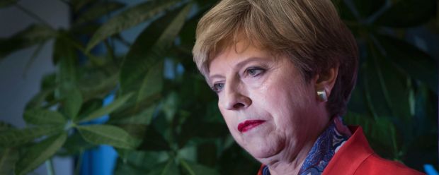 Britain's Prime Minister Theresa May listens as the declaration at her constituency is made for in the general election ...