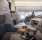 Passenger seats sit in the business class cabin of an Airbus SE A350 aircraft, operated by Singapore Airlines Ltd., ...