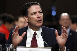 Former FBI Director James Comey speaks during a Senate Intelligence Committee hearing on Capitol Hill, Thursday, June 8, 2017, in Washington.