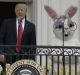 First Lady Melania Trump, US President Donald Trump and the Easter Bunny attend the 2017 White House Easter Egg Roll.