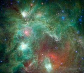 File - Scores of baby stars shrouded by dust are revealed in this infrared image of the star-forming region NGC 2174, as seen by NASA’s Spitzer Space Telescope. Some of the clouds in the region resemble the face of a monkey in visible-light images, hence the nebula's nickname: the "Monkey Head."