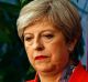 Britain's Prime Minister Theresa May listens as the declaration at her constituency is made for in the general election ...