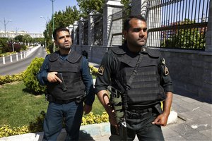 Police patrol outside Iran's parliament building after an assault by several attackers that was claimed by the Islamic State group, in Tehran, Iran, Wednesday, June 7, 2017.