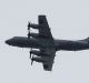 A US P3 Orion surveillance plane flies over Marawi, Philippines, on Friday.