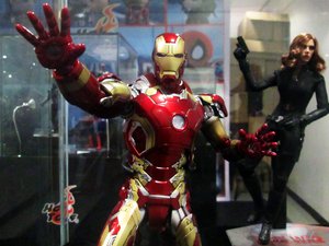 Iron Man, and Black Widow action figure dolls on display at a Toy Convention. Taken on April 2017.