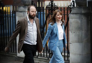 Prime Minister Theresa May's chief of staff Nick Timothy and Joint-chief of staff Fiona Hill leave Conservative Party headquarters in London, Friday, June 9, 2017.