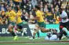 MELBOURNE, AUSTRALIA - JUNE 10:  Israel Folau of the Wallabies runs with the ball as Karmichael Hunt looks on during the ...