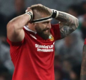 Red alert: Courtney Lawes of the British and Irish Lions and teammates come to terms with defeat against the Blues at ...