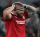 Red alert: Courtney Lawes of the British and Irish Lions and teammates come to terms with defeat against the Blues at ...