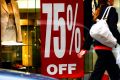 Clothing stores have been forced to offer deep discounts to entice wary consumers to spend.
