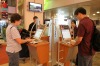 Travellers take advantage of the free internet kiosks.