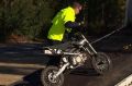 A monkey bike is removed from the campsite at Stradbroke, Victoria.