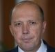 "It is a bill that suits the times we're living in," Immigration Minister Peter Dutton said.