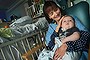 Valley Children's Hospital volunteer cuddler Kerry Abbott rocks Grand Early, nearly 4 months old.