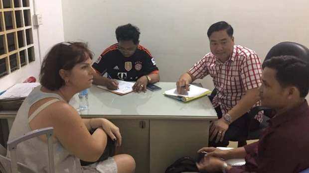 Australian nurse Tammy Davis-Charles is questioned by Cambodian police.