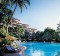 Tropical gardens surround the swimming pool at the Shangri-La Hotel, Singapore. 