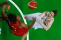 Spain's Laia Palau (left) clashes with United States' Lindsay Whalen during the gold medal game at the 2016 Summer Olympics.