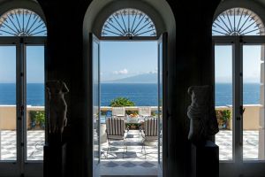 A terrace overlooks the Amalfi coast.   