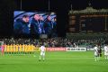 Socceroos players observe a minute's silence before the qualifier in Adelaide on Thursday as Saudi Arabia players ...