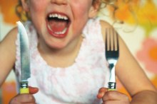 Child yelling at dinner table (Getty images)