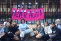 Katie Thorburn, centre, outside NSW Parliament House. 