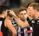 Laying down the law: Nathan Buckley was irate at quarter-time.