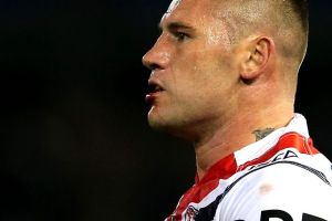 Let go: Shaun Kenny-Dowall of the Roosters.