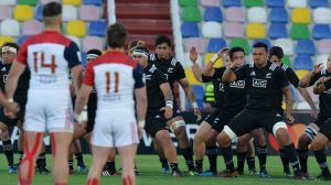 Tense time: The French stare down New Zealand team as they perform the haka.