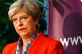 Britain's Prime Minister Theresa May listens as the declaration at her constituency is made in the general election in ...