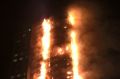 Grenfell Tower burns ferociously. 