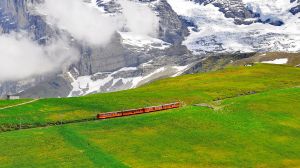 Cogwheel train from Jungfraujoch station moves to Kleine Scheidegg. SatMar11Switzerland - Switzerland rail adventures ...