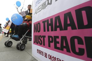 A banner is placed before a rally to oppose the plan to deploy the Terminal High-Altitude Area Defense system, or THAAD, at downtown Seoul, South Korea, Wednesday, March 8, 2017.