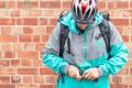 A Deliveroo driver in the current uniform, which is becoming a popular eBay item due to its highly reflective fabric. 