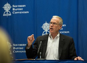 Barrett Duke, chairman of the 2017 Southern Baptist Convention's Committee on Resolutions, answers questions at a news conference following the passage of nine resolutions on Tuesday, June 13, 2017 in Phoenix.